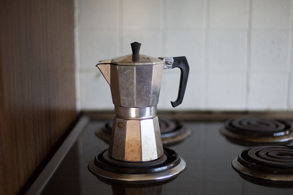 Moka Coffee Maker Pot On Gas Stove. Stock Photo, Picture and